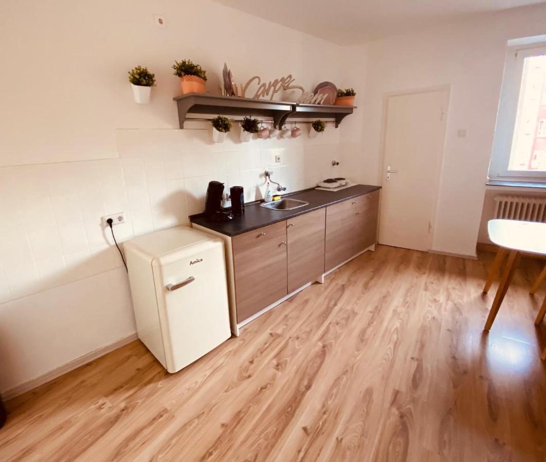 Tm Aparts Dortmund Esterno foto A typical kitchen in a student apartment